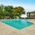 a swimming pool in a backyard