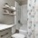 a bathroom with a shower curtain