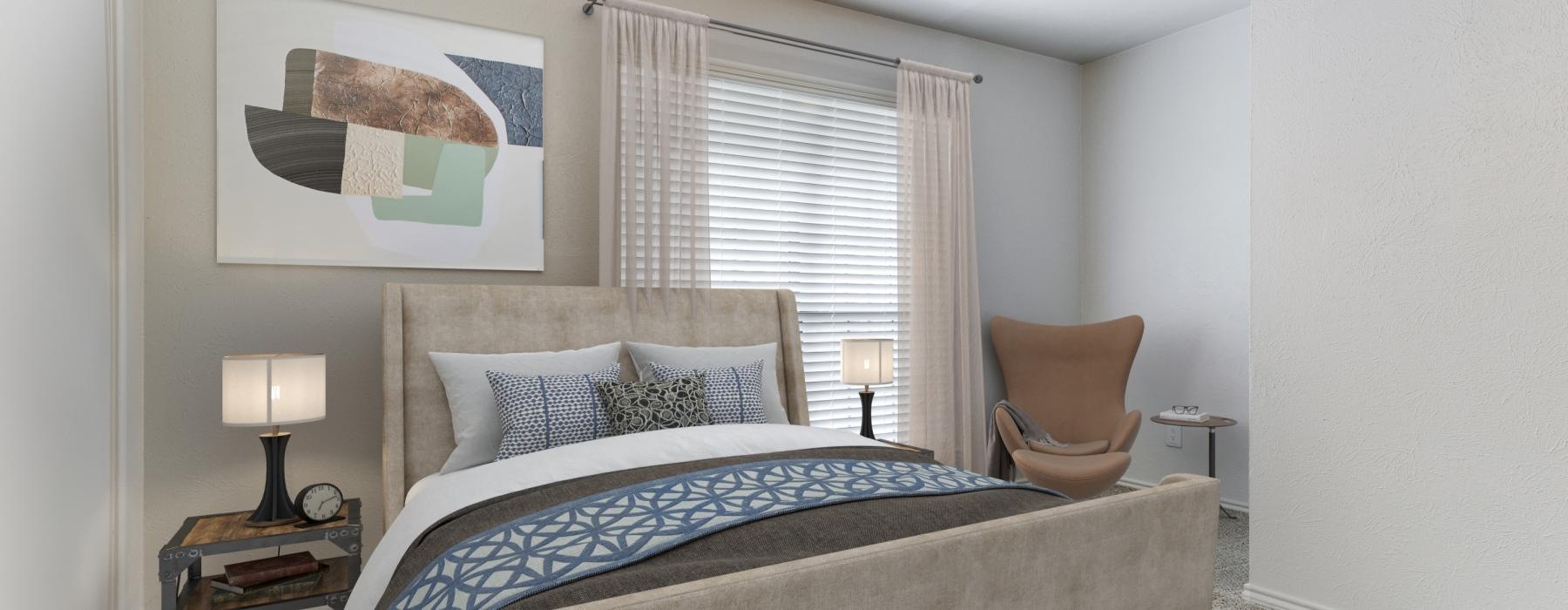 a bedroom with a bed and a chair