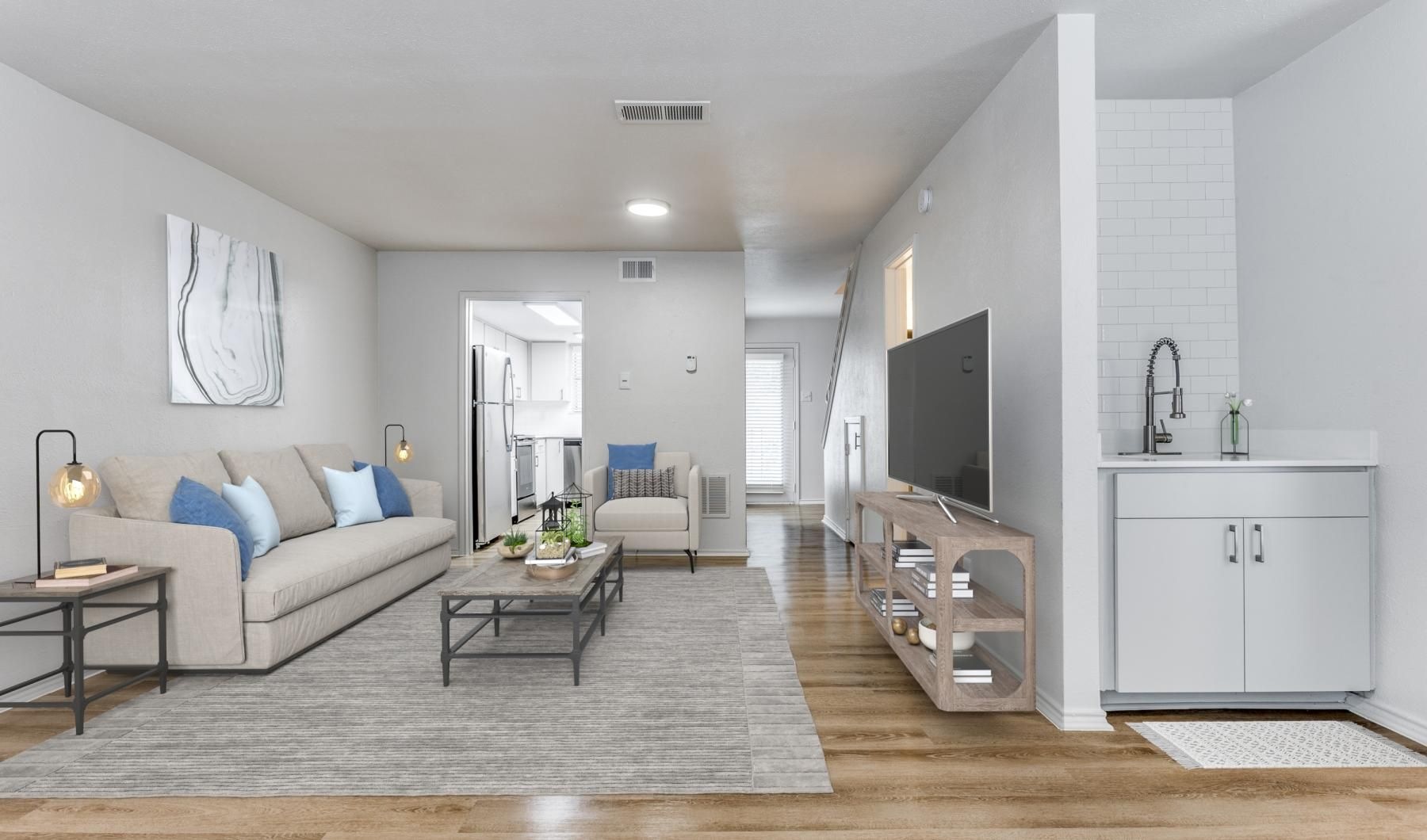 a living room with a wood floor
