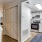 a kitchen with white cabinets