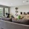 a living room with a couch and a chair