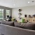 a living room with a couch and a chair
